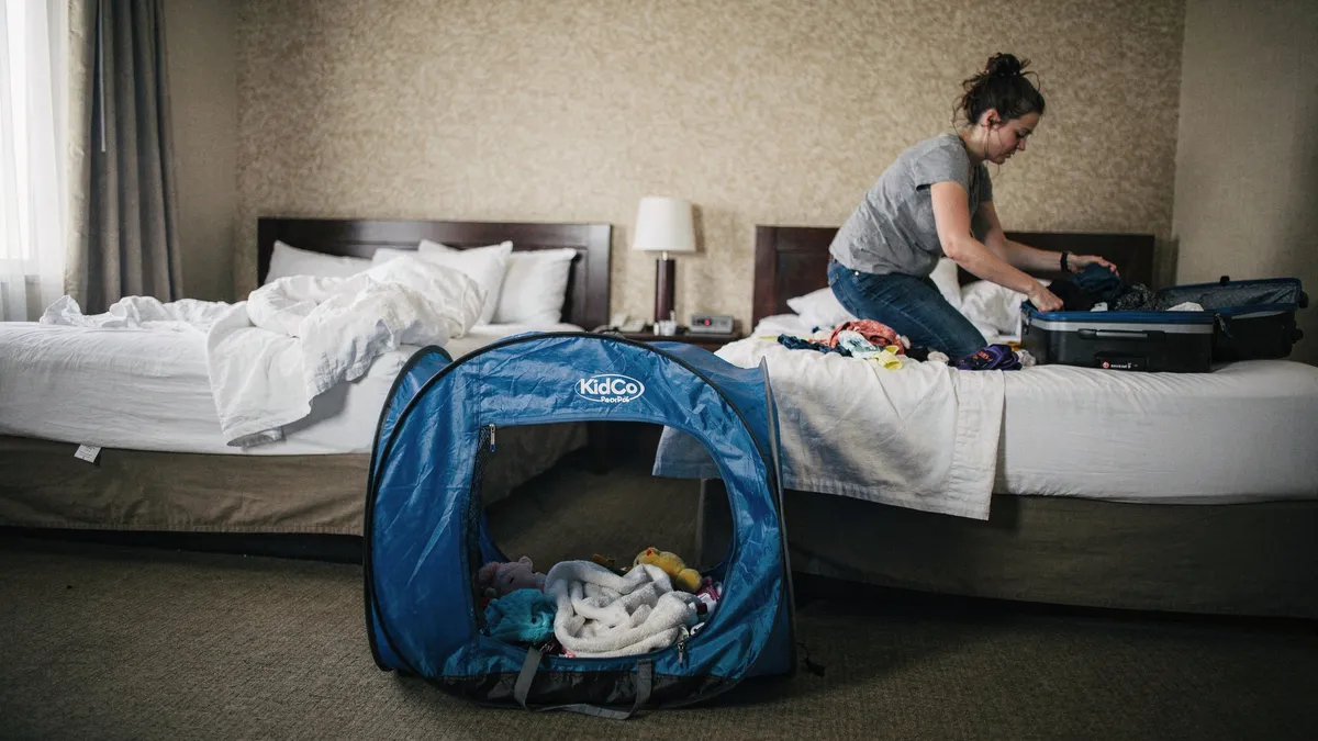 A Guide To Toddler Travel Beds for Overnight Family Trips